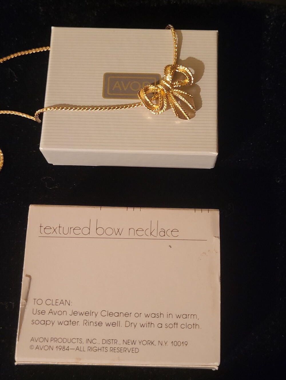 Vintage 1984 Avon Textured Bow Necklace - New In Box with Sleeve